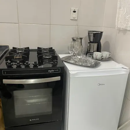 Hospedagem Deoli - Suites Cozinha Compacta Cabo Frio Quarto foto